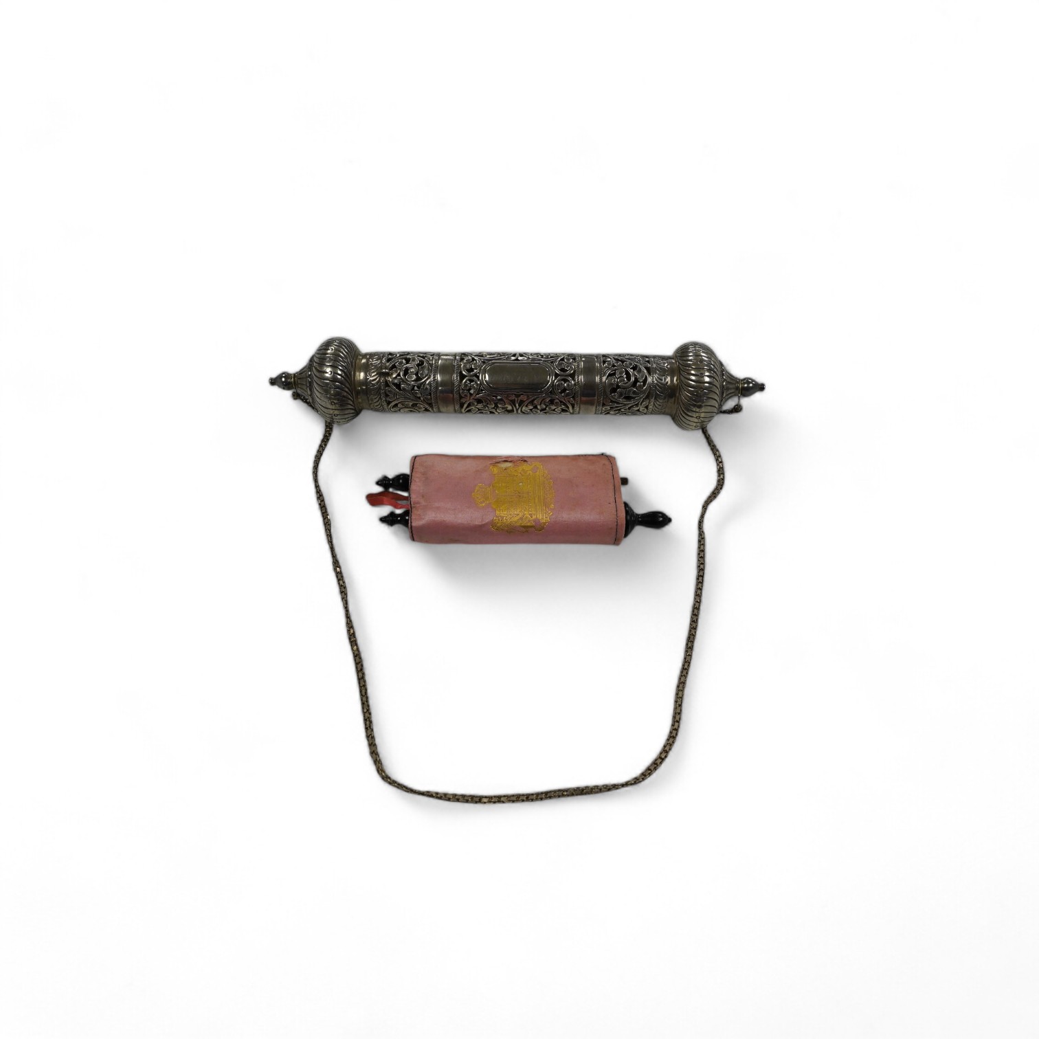Two Judaica items, to include a pierced white metal scroll holder, 27cm and a miniature Torah portion scroll. Condition - poor to fair